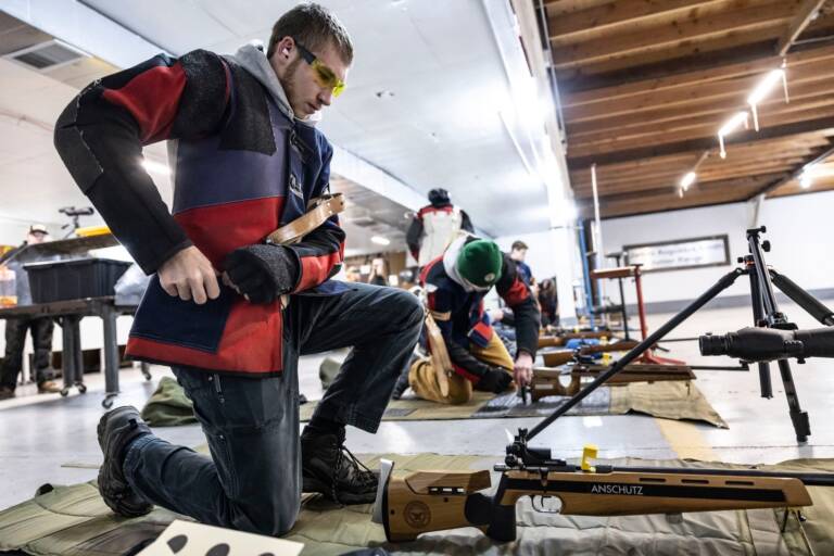 Student getting ready for prone position